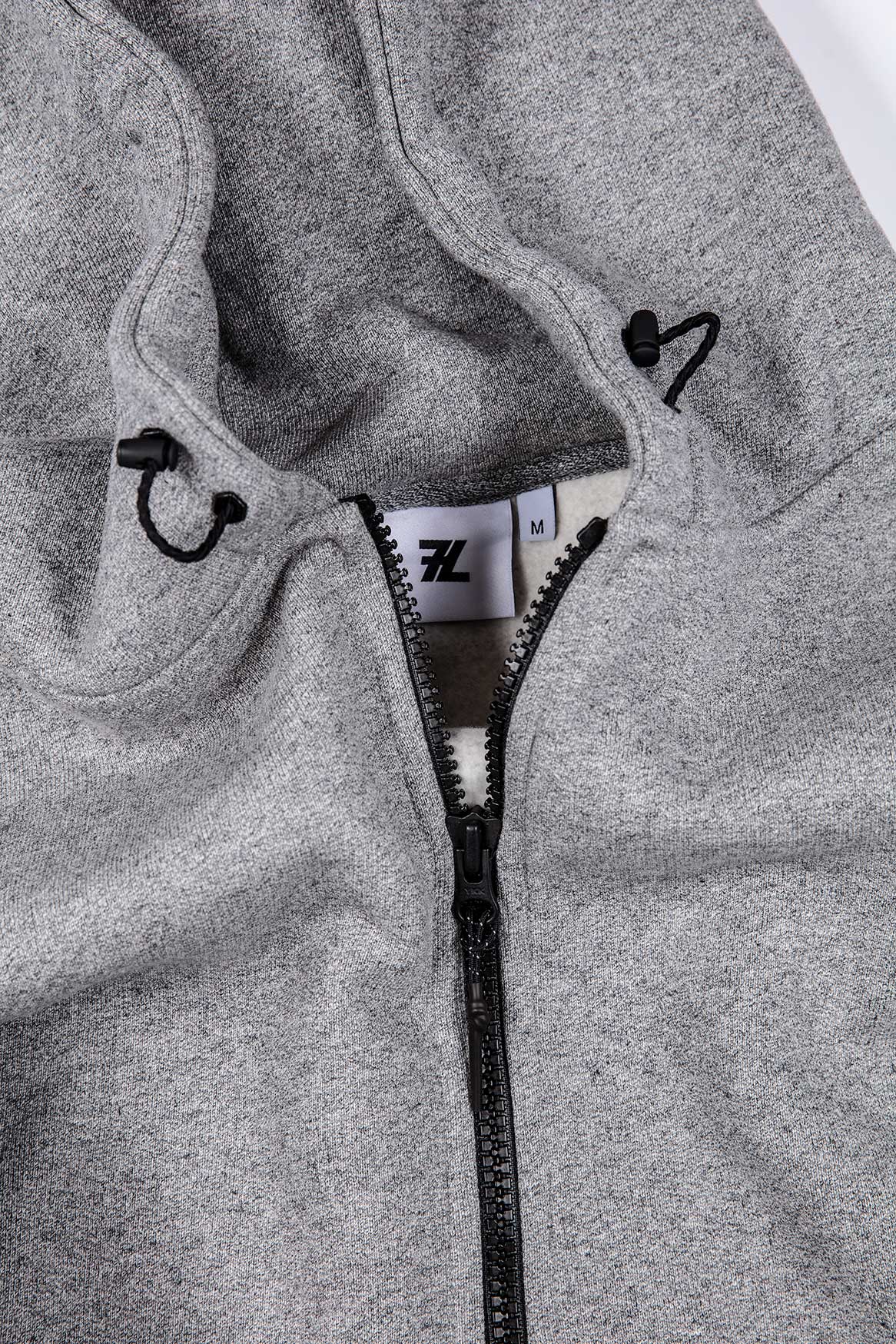 L3. GREY MARL ZIPPED HOODIE
